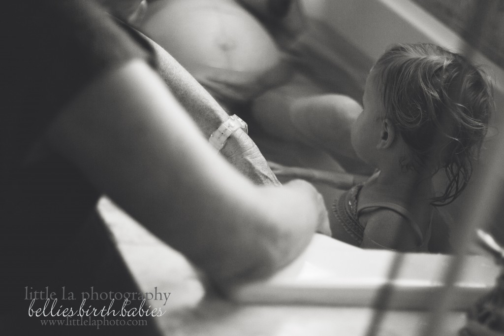 sibling in the birthing tub photos